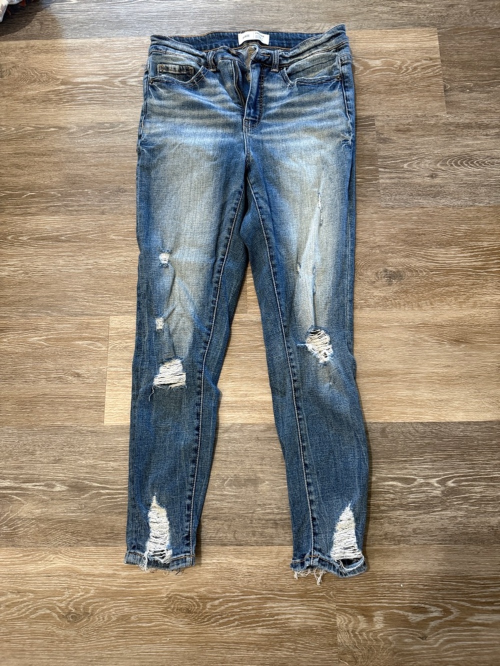 High rise  Distressed Skinny Jeans in Denim Blue